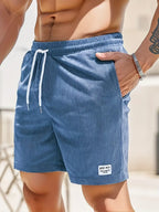 Short de bain homme à cordon, coloris Bleu