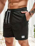 Short de bain homme à cordon, coloris Noir