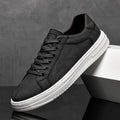 Baskets homme tige basse, coloris Noir