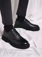 Derbies homme à œillets, coloris Noir, vue principale