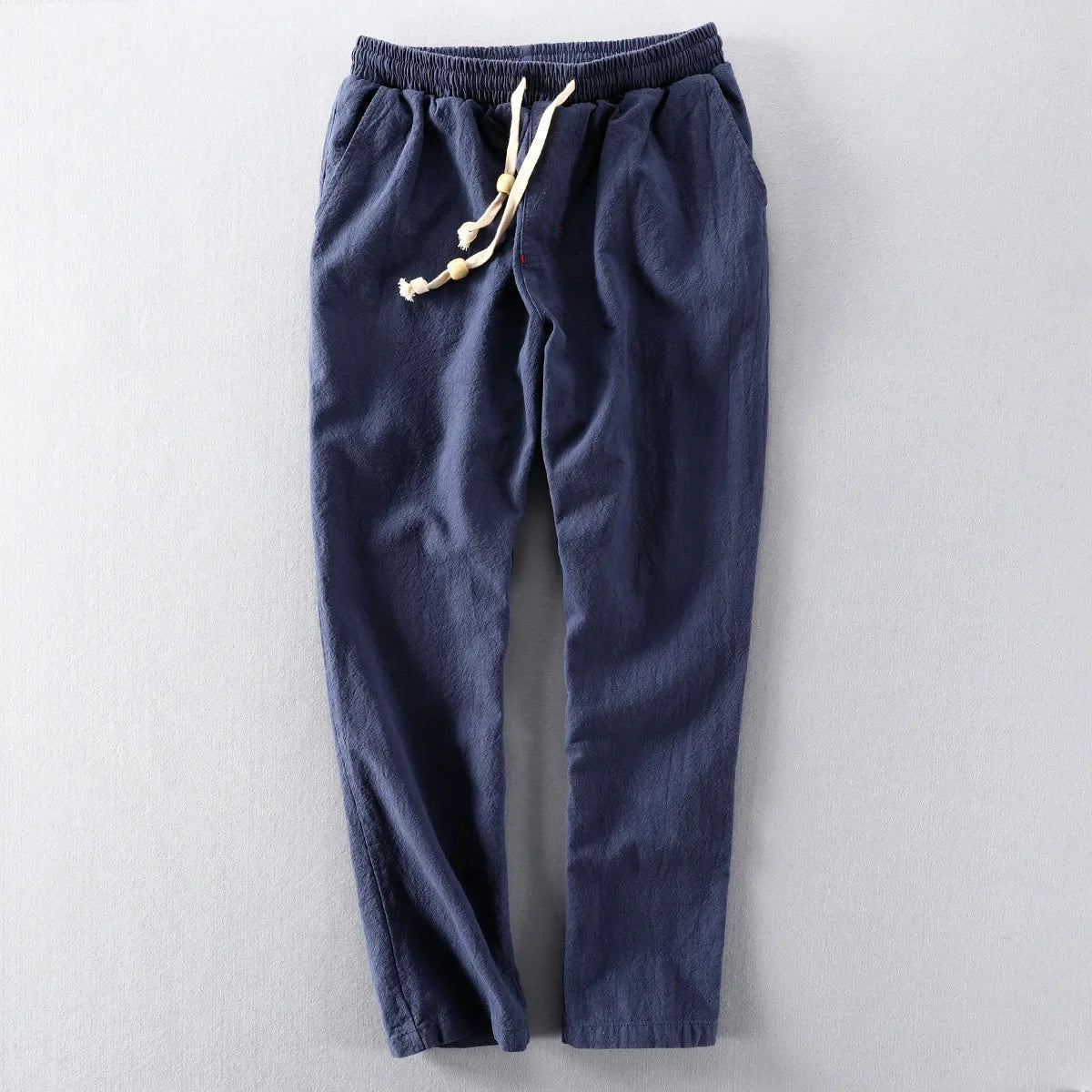 Pantalon homme bas resserré, coloris Bleu marine
