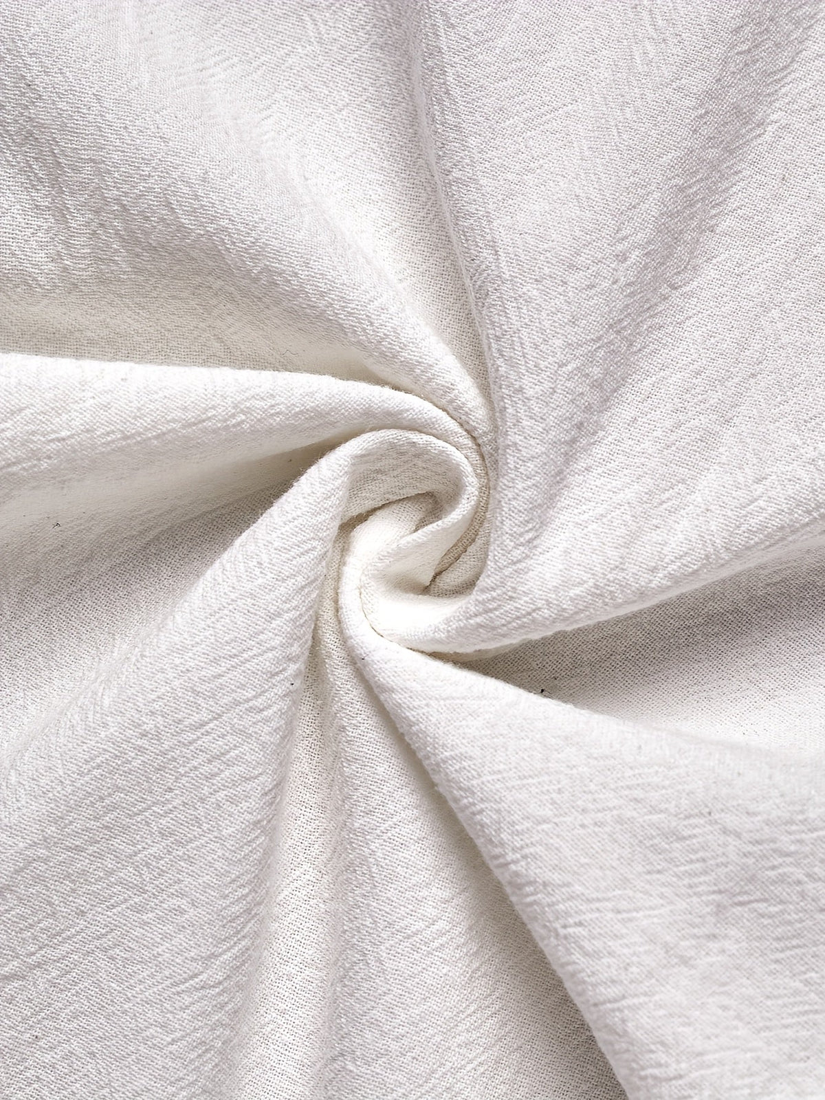 Gros plan sur la texture du pantalon homme blanc