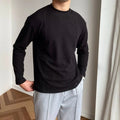 Pull homme col rond texturé, coloris Noir