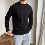 Pull homme col rond texturé, coloris Noir