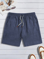 Short homme finition texturée, coloris Bleu marine